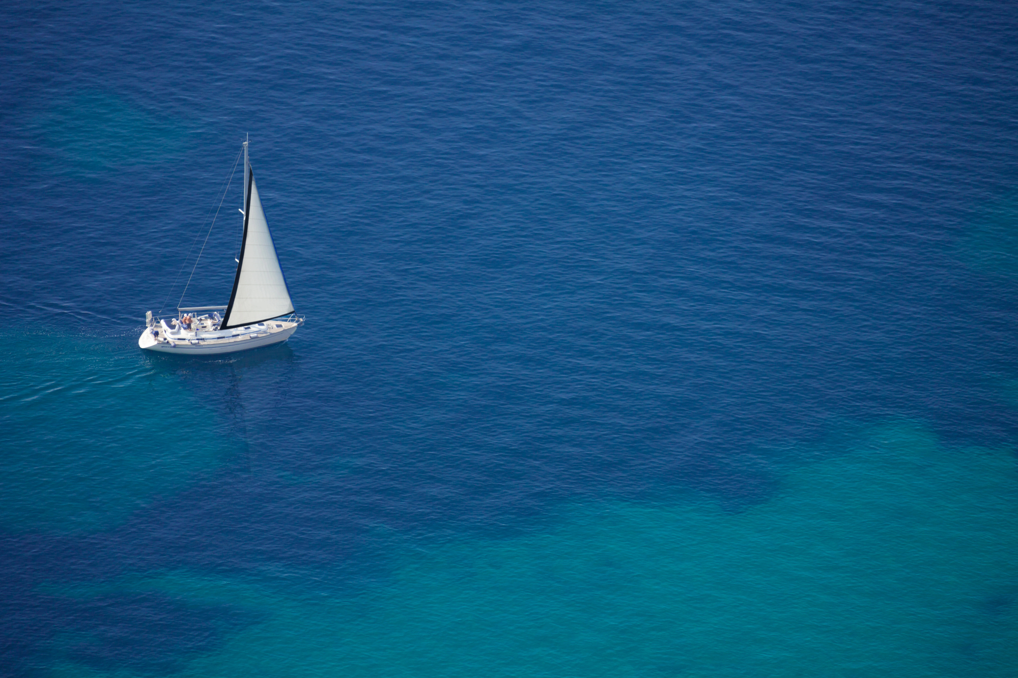 Sailboat gliding across the deep blue Adriatic sea