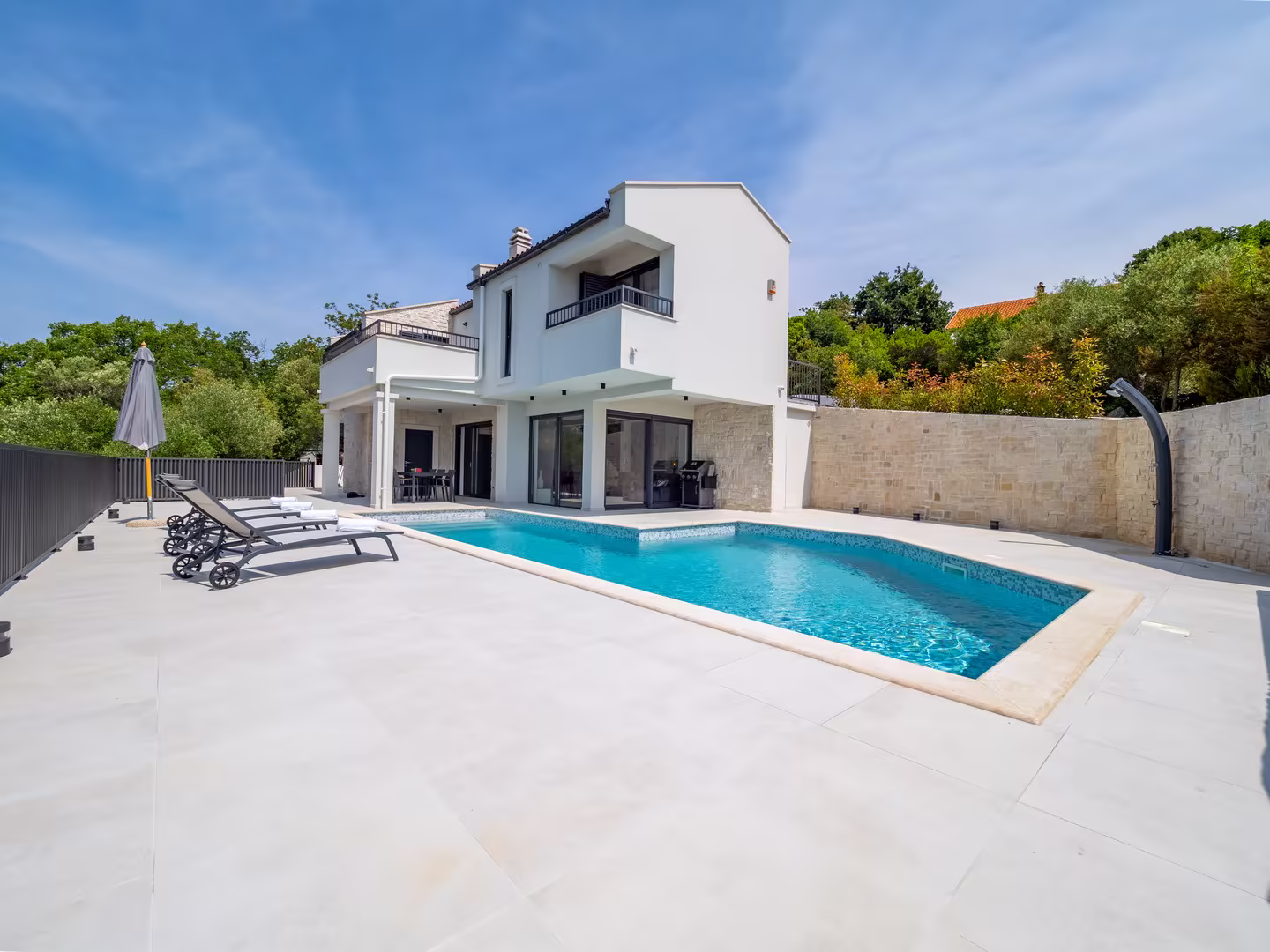 Coastal villa terrace welcoming dogs